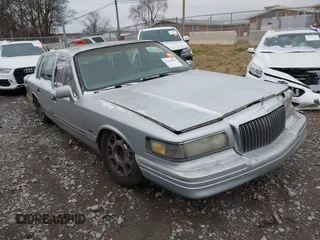 1997 Lincoln Town Car Cartier with VIN 1LNLM83W7VY634832, listed as a IAAI auction lot 41245003 with 17,911 mi miles and . Bid and sale history available at DreamBid. Image 1.