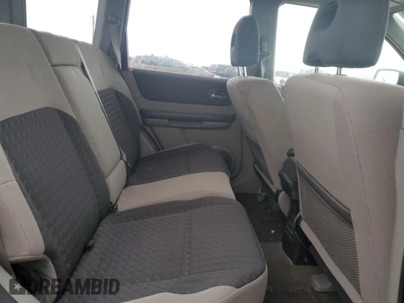 2006 Nissan X-Trail XE z VIN JN8BT08V76W212159, wystawiony jako Copart lot #86215994 z przebiegiem 230 211 mil mil oraz Szkody całkowita. Historia ofert i sprzedaży dostępna na DreamBid. Obrazek 11.