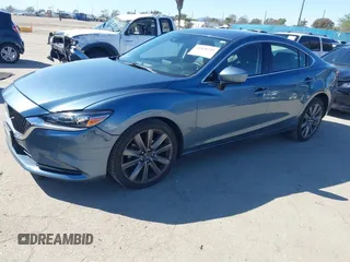 2018 Mazda 6 Grand Touring with VIN JM1GL1TY4J1333021, listed as a IAAI auction lot 41818719 with 56,188 mi miles and . Bid and sale history available at DreamBid. Image 19.