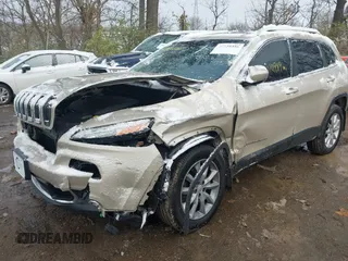 2015 Jeep Cherokee Limited z VIN 1C4PJMDS5FW623361, wystawiony jako IAAI lot #40920356 z przebiegiem 110 989 mil mil oraz . Historia ofert i sprzedaży dostępna na DreamBid. Obrazek 6.