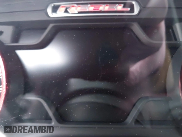 2019 Ram 1500 Rebel z VIN 1C6SRFLT6KN599362, wystawiony jako IAAI lot #41560018 z przebiegiem Nie podano mil oraz . Historia ofert i sprzedaży dostępna na DreamBid. Obrazek 7.
