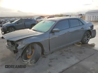 2018 Chrysler 300 S with VIN 2C3CCABG7JH151553, listed as a Copart auction lot 84757524 with 140,800 mi miles and Salvage Title. Bid and sale history available at DreamBid. Image 1.