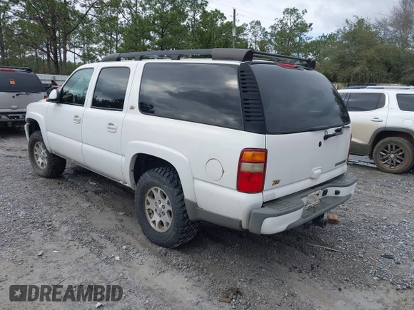 2003 Chevrolet Suburban LT z VIN 3GNFK16Z23G280270, wystawiony jako IAAI lot #41627119 z przebiegiem 246 282 mil mil oraz . Historia ofert i sprzedaży dostępna na DreamBid. Obrazek 3.