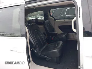 2017 Chrysler Pacifica Touring L with VIN 2C4RC1BG4HR583463, listed as a IAAI auction lot 41487599 with 180,459 mi miles and . Bid and sale history available at DreamBid. Image 8.