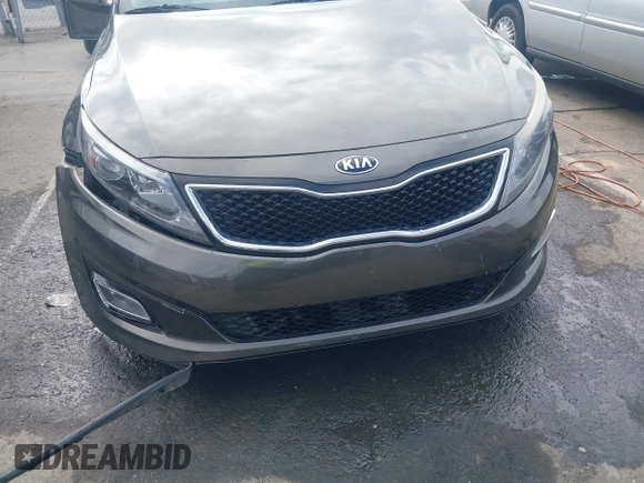 2015 Kia Optima LX with VIN 5XXGM4A72FG400848, listed as a IAAI auction lot 40802198 with 173,270 mi miles and . Bid and sale history available at DreamBid. Image 19.