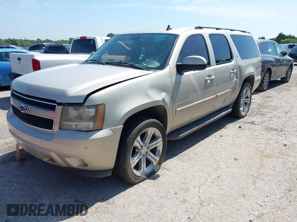 2007 Chevrolet Suburban LS with VIN 1GNFC16087J218794, listed as a IAAI auction lot 42700630 with 262,428 mi miles and . Bid and sale history available at DreamBid. Image 2.