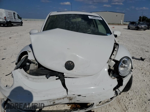 2009 Volkswagen Beetle S с VIN 3VWRW31C79M505010, выставлен на аукционе Copart как лот 73480374 с пробегом 111 349 миль миль и Списание • Salvage title. История ставок и продаж доступна на DreamBid. Изображение 5.