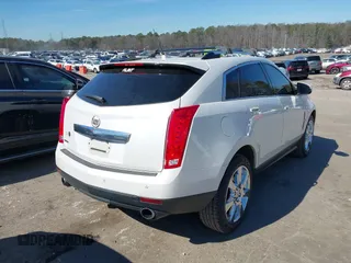 2010 Cadillac SRX Premium Collection with VIN 3GYFNCEYXAS592846, listed as a IAAI auction lot 41641146 with 232,642 mi miles and . Bid and sale history available at DreamBid. Image 4.