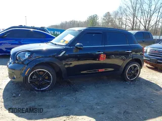 2015 MINI Countryman S with VIN WMWZC3C5XFWT04916, listed as a IAAI auction lot 41636369 with 101,448 mi miles and . Bid and sale history available at DreamBid. Image 14.