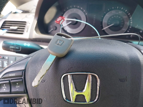 2012 Honda Odyssey EX-L with VIN 5FNRL5H63CB063684, listed as a IAAI auction lot 42576742 with 170,656 mi miles and . Bid and sale history available at DreamBid. Image 11.
