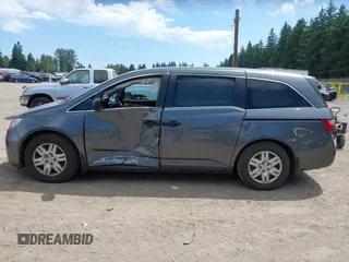 2012 Honda Odyssey LX с VIN 5FNRL5H23CB049703, выставлен на аукционе IAAI как лот 42467459 с пробегом 96 247 миль миль и . История ставок и продаж доступна на DreamBid. Изображение 14.