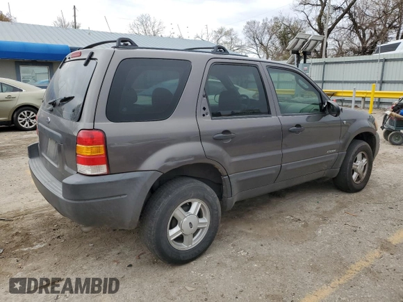 2002 Ford Escape XLS Choice with VIN 1FMYU02102KB67376, listed as a Copart auction lot 79109394 with 234,306 mi miles and Salvage title. Bid and sale history available at DreamBid. Image 3.