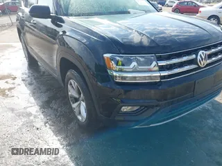 2018 Volkswagen Atlas SE with VIN 1V2DR2CA9JC540162, listed as a IAAI auction lot 41631056 with 80,802 mi miles and . Bid and sale history available at DreamBid. Image 6.