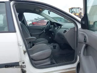 2003 Ford Focus LX with VIN 1FAFP33P33W156797, listed as a IAAI auction lot 42086475 with 200,727 mi miles and . Bid and sale history available at carsss.com. Image 5.