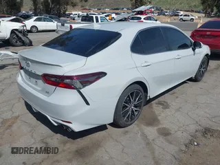 2023 Toyota Camry SE with VIN 4T1T11AK8PU178317, listed as a IAAI auction lot 41915729 with 22,264 mi miles and . Bid and sale history available at DreamBid. Image 4.