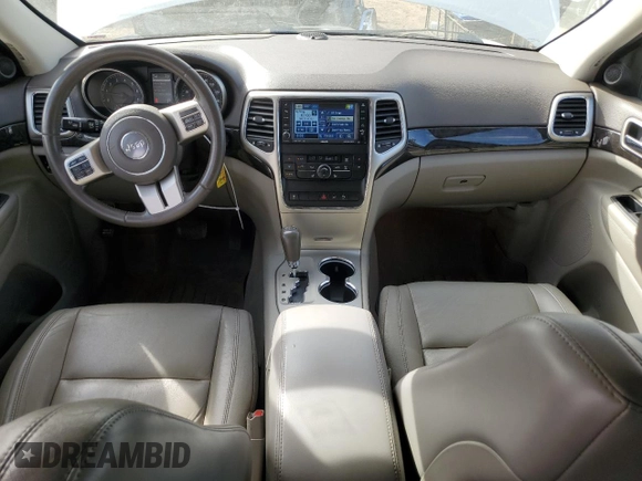 2011 Jeep Grand Cherokee Laredo with VIN 1J4RR4GG8BC718852, listed as a Copart auction lot 49852535 with 101,945 mi miles and Salvage Title. Bid and sale history available at carsss.com. Image 8.
