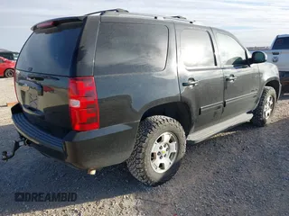 2013 Chevrolet Tahoe LS with VIN 1GNSCAE03DR193235, listed as a IAAI auction lot 41604766 with 204,455 mi miles and . Bid and sale history available at DreamBid. Image 4.