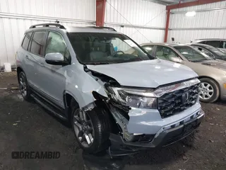 2022 Honda Passport EX-L with VIN 5FNYF7H52NB000679, listed as a IAAI auction lot 41449757 with 38,672 mi miles and . Bid and sale history available at carsss.com. Image 1.