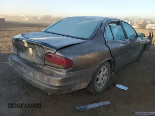 2002 Oldsmobile Intrigue GX z VIN 1G3WH52HX2F253040, wystawiony jako Copart lot #85429974 z przebiegiem 252 469 mil mil oraz Szkoda całkowita • Salvage title. Historia ofert i sprzedaży dostępna na DreamBid. Obrazek 3.