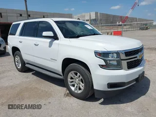 2015 Chevrolet Tahoe LS z VIN 1GNSCAKC6FR239156, wystawiony jako IAAI lot #42545513 z przebiegiem 117 863 mil mil oraz . Historia ofert i sprzedaży dostępna na DreamBid. Obrazek 1.
