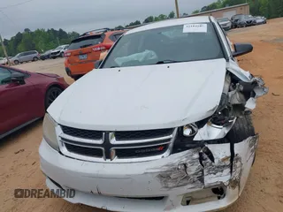 2014 Dodge Avenger SE with VIN 1C3CDZAB4EN226417, listed as a IAAI auction lot 42104189 with 155,454 mi miles and . Bid and sale history available at DreamBid. Image 12.