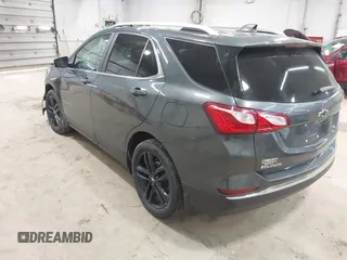 2021 Chevrolet Equinox LT with VIN 3GNAXUEV2ML375190, listed as a IAAI auction lot 41991148 with 60,016 mi miles and . Bid and sale history available at DreamBid. Image 3.