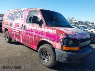 2005 Chevrolet Express Cargo Van with VIN 1GCGG25V151131305, listed as a IAAI auction lot 41338001 with 252,855 mi miles. Bid and sale history available at carsss.com. Image 1.