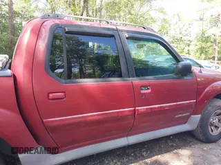 2001 Ford Explorer Sport Trac z VIN 1FMZU67EX1UA94698, wystawiony jako IAAI lot #42764474 z przebiegiem 299 653 mil mil oraz . Historia ofert i sprzedaży dostępna na DreamBid. Obrazek 12.