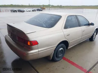 2000 Toyota Camry CE with VIN JT2BG22K8Y0509997, listed as a IAAI auction lot 41902781 with 221,991 mi miles. Bid and sale history available at carsss.com. Image 4.