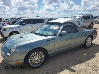 2004 Ford Thunderbird Pacific Coast Roadster with VIN 1FAHP63A04Y108766, listed as a Copart auction lot 74766964 with 30,107 mi miles and Salvage Title. Bid and sale history available at DreamBid. Image 1.