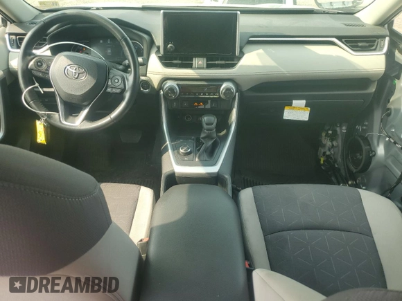 2023 Toyota RAV4 Hybrid XLE with VIN JTMRWRFV7PD166743, listed as a Copart auction lot 59964505 with 87,404 mi miles and Salvage title. Bid and sale history available at DreamBid. Image 8.