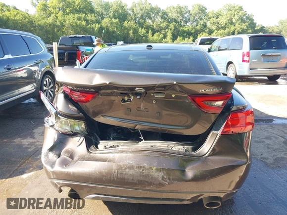 2016 Nissan Maxima Platinum z VIN 1N4AA6AP3GC385276, wystawiony jako IAAI lot #42547410 z przebiegiem 100 307 mil mil oraz . Historia ofert i sprzedaży dostępna na DreamBid. Obrazek 15.