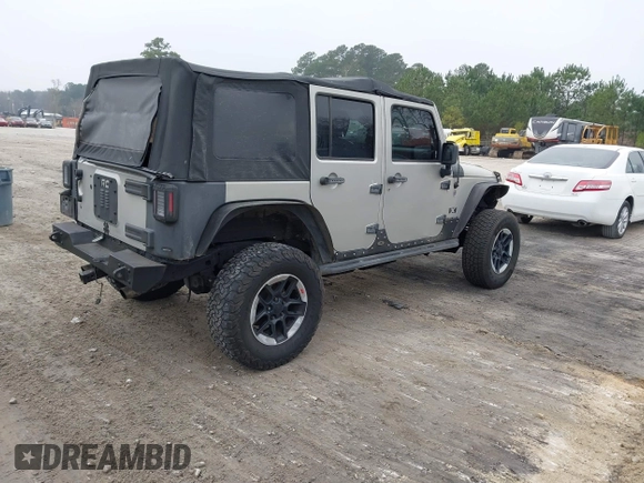 2007 Jeep Wrangler Unlimited X with VIN 1J4GA391X7L107424, listed as a IAAI auction lot 41752013 with 196,557 mi miles and . Bid and sale history available at DreamBid. Image 4.