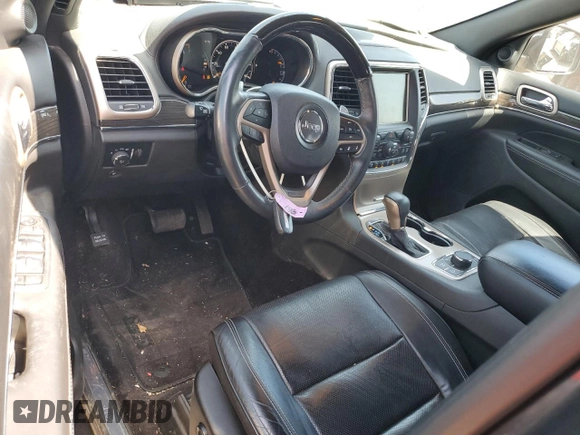 2017 Jeep Grand Cherokee Overland with VIN 1C4RJFCGXHC941983, listed as a Copart auction lot 52008825 with 65,776 mi miles and Salvage Title. Bid and sale history available at carsss.com. Image 8.