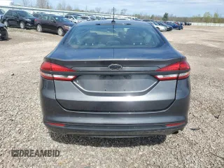 2018 Ford Fusion SE z VIN 3FA6P0H78JR108395, wystawiony jako Copart lot #55308795 z przebiegiem Nie podano mil oraz Szkoda całkowita • Salvage title. Historia ofert i sprzedaży dostępna na DreamBid. Obrazek 6.