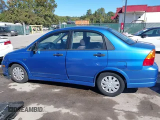 2003 Suzuki Aerio S z VIN JS2RA41SX35171394, wystawiony jako IAAI lot #40612266 z przebiegiem 70 127 mil mil oraz . Historia ofert i sprzedaży dostępna na DreamBid. Obrazek 14.
