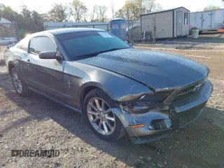 2010 Ford Mustang V6 with VIN 1ZVBP8AN6A5157773, listed as a IAAI auction lot 41921156 with 118,549 mi miles. Bid and sale history available at carsss.com. Image 1.