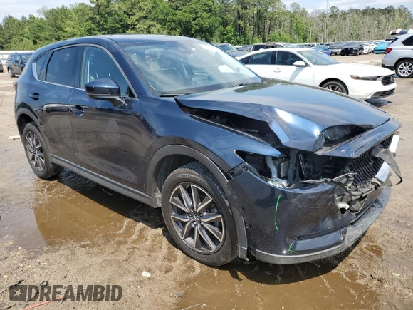2018 Mazda CX-5 Grand Touring with VIN JM3KFADM3J1312519, listed as a Copart auction lot 56276685 with 109,486 mi miles and Clean title. Bid and sale history available at DreamBid. Image 4.