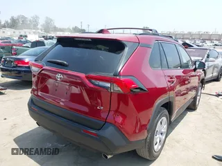 2019 Toyota RAV4 LE with VIN JTMK1RFV4KD025587, listed as a IAAI auction lot 42459046 with 73,852 mi miles and . Bid and sale history available at DreamBid. Image 4.