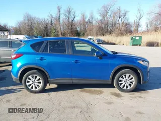 2013 Mazda CX-5 Touring z VIN JM3KE4CE7D0119119, wystawiony jako IAAI lot #41802331 z przebiegiem 204 417 mil mil oraz . Historia ofert i sprzedaży dostępna na DreamBid. Obrazek 13.