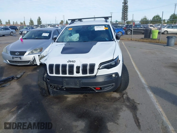 2019 Jeep Cherokee Trailhawk Elite with VIN 1C4PJMBX7KD410612, listed as a IAAI auction lot 41878935 with 55,163 mi miles. Bid and sale history available at carsss.com. Image 13.