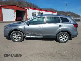 2015 Mazda CX-9 Sport with VIN JM3TB2BA6F0455539, listed as a IAAI auction lot 41839466 with 143,667 mi miles and . Bid and sale history available at carsss.com. Image 15.
