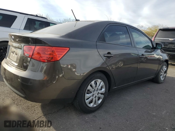 2011 Kia Forte EX with VIN KNAFU4A29B5422728, listed as a Copart auction lot 86717464 with 48,921 mi miles and Salvage Title. Bid and sale history available at carsss.com. Image 3.