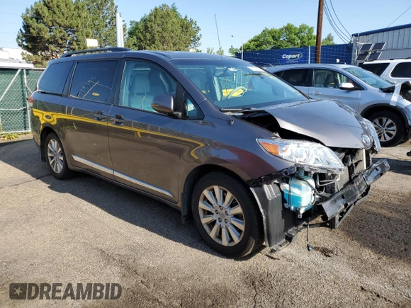2014 Toyota Sienna Limited with VIN 5TDDK3DC8ES078175, listed as a Copart auction lot 61138585 with 98,527 mi miles and Salvage title. Bid and sale history available at DreamBid. Image 4.
