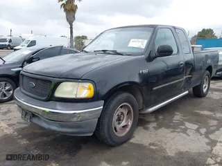 1999 Ford F-150 Work Series with VIN 1FTZX1720XKA54784, listed as a IAAI auction lot 41572757 with NaN miles. Bid and sale history available at carsss.com. Image 19.