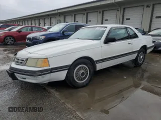 1987 Ford Thunderbird z VIN 1FABP6033HH186394, wystawiony jako Copart lot #51699135 z przebiegiem 86 393 mil mil oraz Nie do naprawy. Historia ofert i sprzedaży dostępna na DreamBid. Obrazek 1.