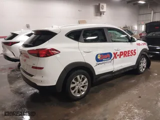 2020 Hyundai Tucson Value with VIN KM8J3CA41LU173419, listed as a IAAI auction lot 40915699 with 90,996 mi miles. Bid and sale history available at carsss.com. Image 4.