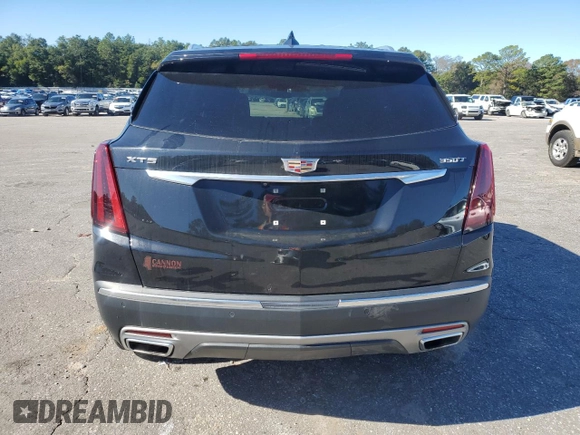 2023 Cadillac XT5 FWD Premium Luxury with VIN 1GYKNCR40PZ189444, listed as a Copart auction lot 84803094 with 22,827 mi miles and Clean Title. Bid and sale history available at carsss.com. Image 6.