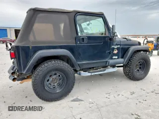 2000 Jeep Wrangler Sahara with VIN 1J4FA59S1YP777549, listed as a Copart auction lot 63622335 with 197,426 mi miles and Clean title. Bid and sale history available at DreamBid. Image 3.