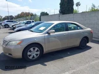 2007 Toyota Camry CE with VIN 4T1BE46KX7U716414, listed as a IAAI auction lot 42116250 with 104,298 mi miles and . Bid and sale history available at DreamBid. Image 14.